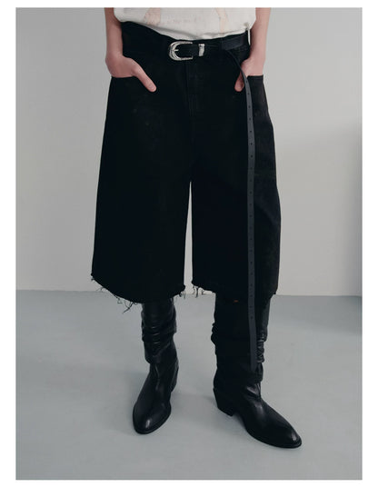 BLACK MUD-DYED DISTRESSED JEANS