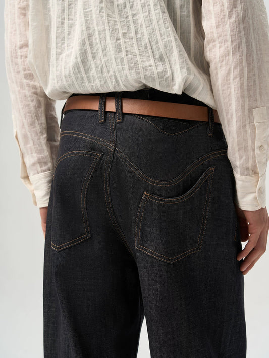 ASYMMETRICAL TWISTED DENIM