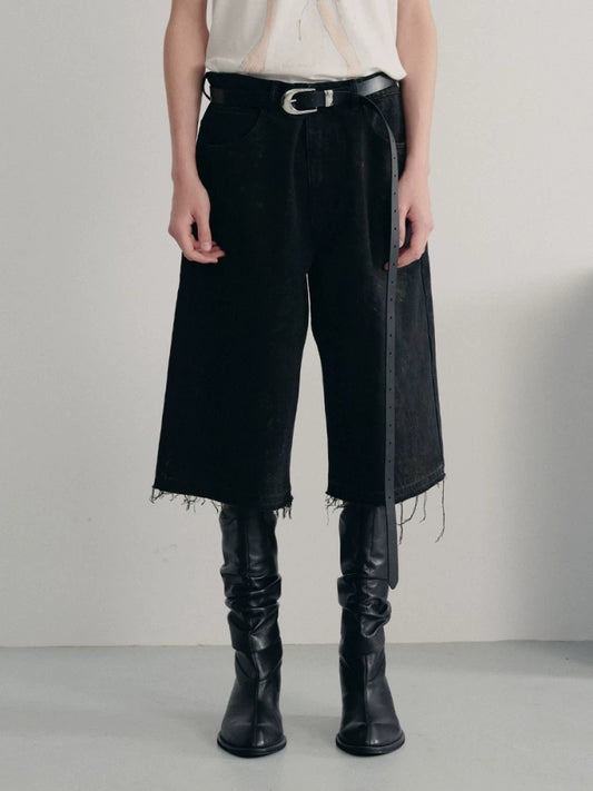 BLACK MUD-DYED DISTRESSED JEANS