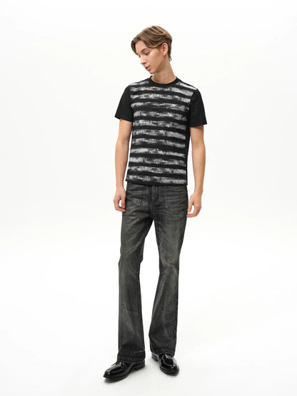 WAXED FLARE DENIM PANTS